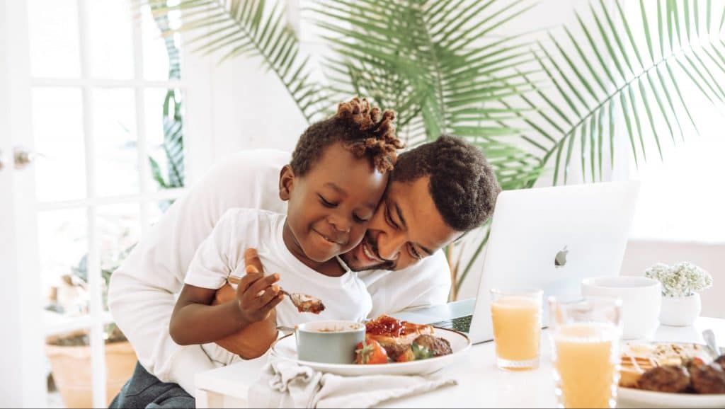 2 people smiling who are sharing a good breakfast. Regular medical check ups make your mind more eased.