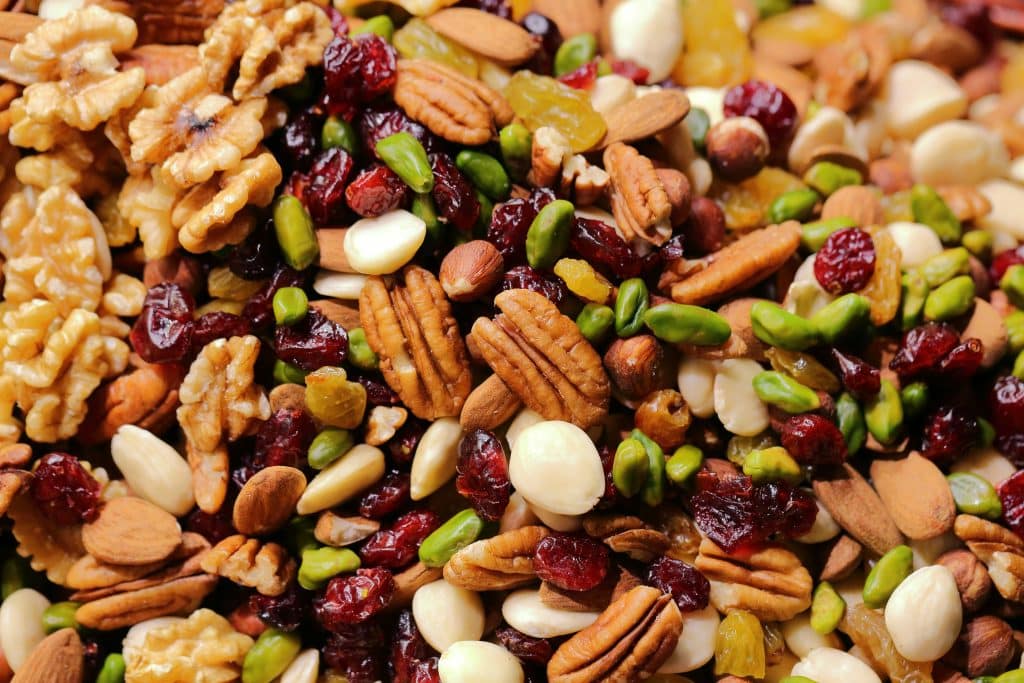Photo of a mixture of nuts and dried fruit.