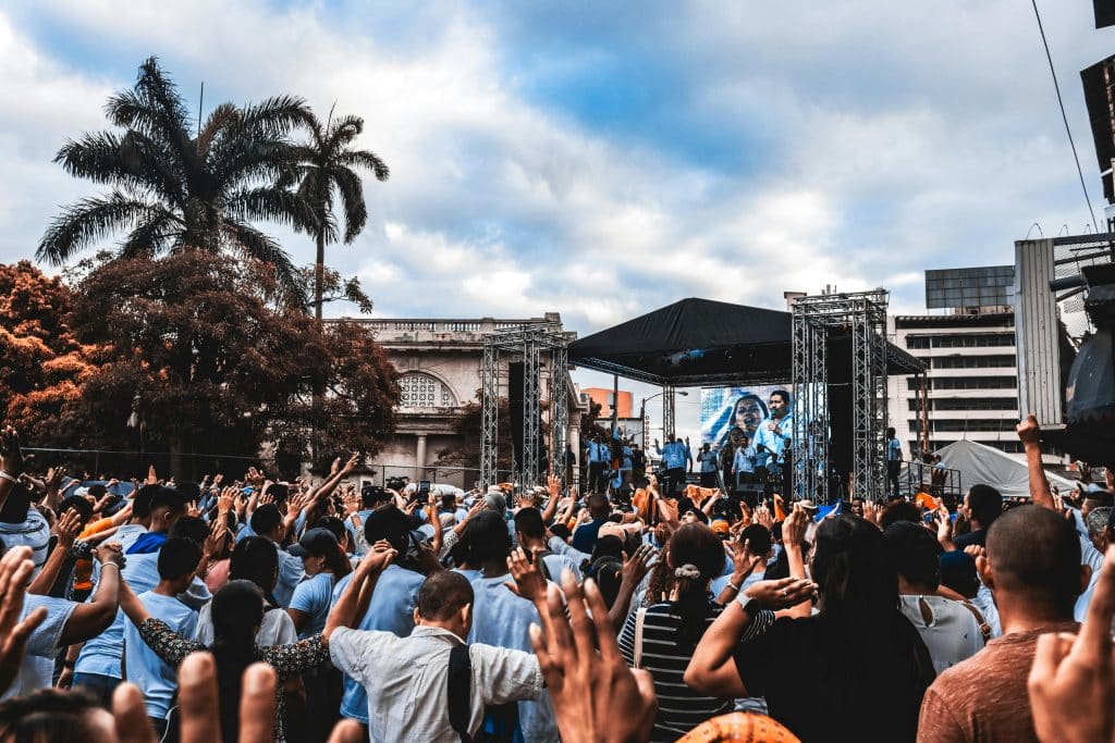 Photo of a crowd going wild at an open-air concert in Nairobi, Kenya.
